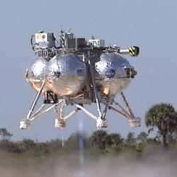 Prototype lunar lander Morpheus hovers above the ground during a test flight