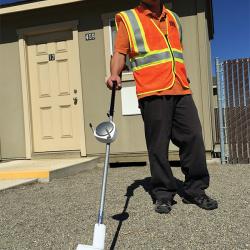 Scientist with methane sensor