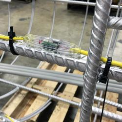 Thermal integrity profiler attached to rebar