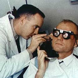 A NASA scientist examines John Glenn’s eye motions