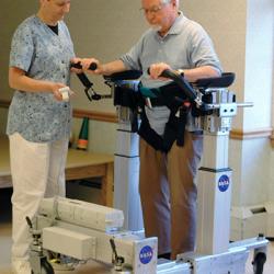 A nurse guides a patient using the Secure Ambulation Module