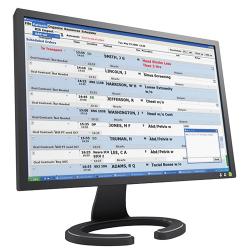 A computer monitor displays names and medical procedures