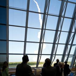 NASA staff watching space shuttle launch
