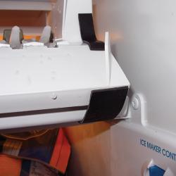 Application of a structural patch on an ice maker