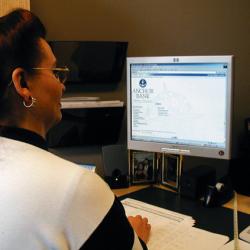 Employee using Lucidoc Management System at a bank