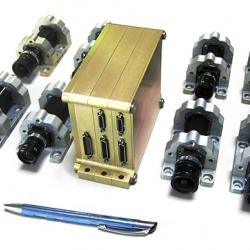 Smaller, more capable RocketCam Digital Video Systems such as this will be used onboard future NASA, commercial, and defense rockets and spacecraft. Credit: Ecliptic Enterprises Corporation An eight-camera digital video system with a pen for size comparison