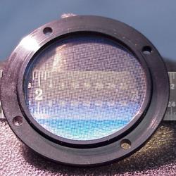 An advanced thin foil filter with a ruler behind it