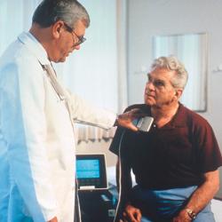 A physician checks a patient's advanced Trilogy pacemaker.