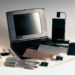 Notebook computer with tiny heat pipes uses to cool the main central processor chip