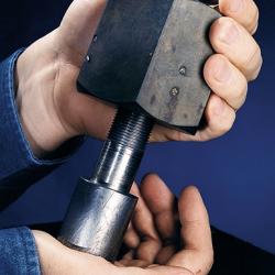 Two hands holding the quick connect nut licensed by M&A Screw and Machine Works