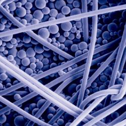 An electromicrograph shows the microencapsulated phase change materials in the insulation