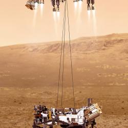 The sky crane landing systems descends toward Mars with the Curiosity rover