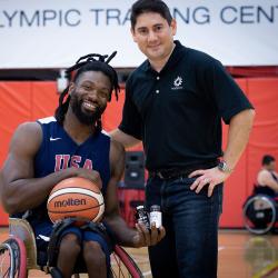 Matt Scott, a five-time Paralympian and a double gold Paralympic medalist, poses with Carlos Montesinos, managing director and chief scientist at Nugevity