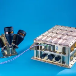 NDL is pictured with its three telescopes and the chassis that contains the electronics and photonics