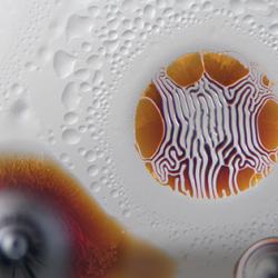 Concept Zero recently partnered with artist Linden Gledhill to launch a line of Gledhill’s art. He created the images by using a magnetic field to manipulate ferrofluids diluted with solvents and photographing the results. Ferrofluid art by Linden Gledhill